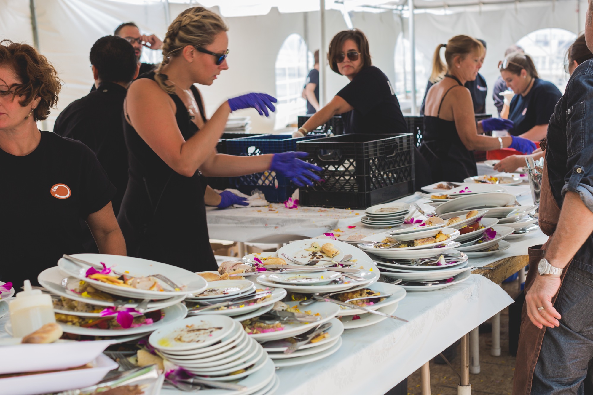 Roundabout catering team plating food for service