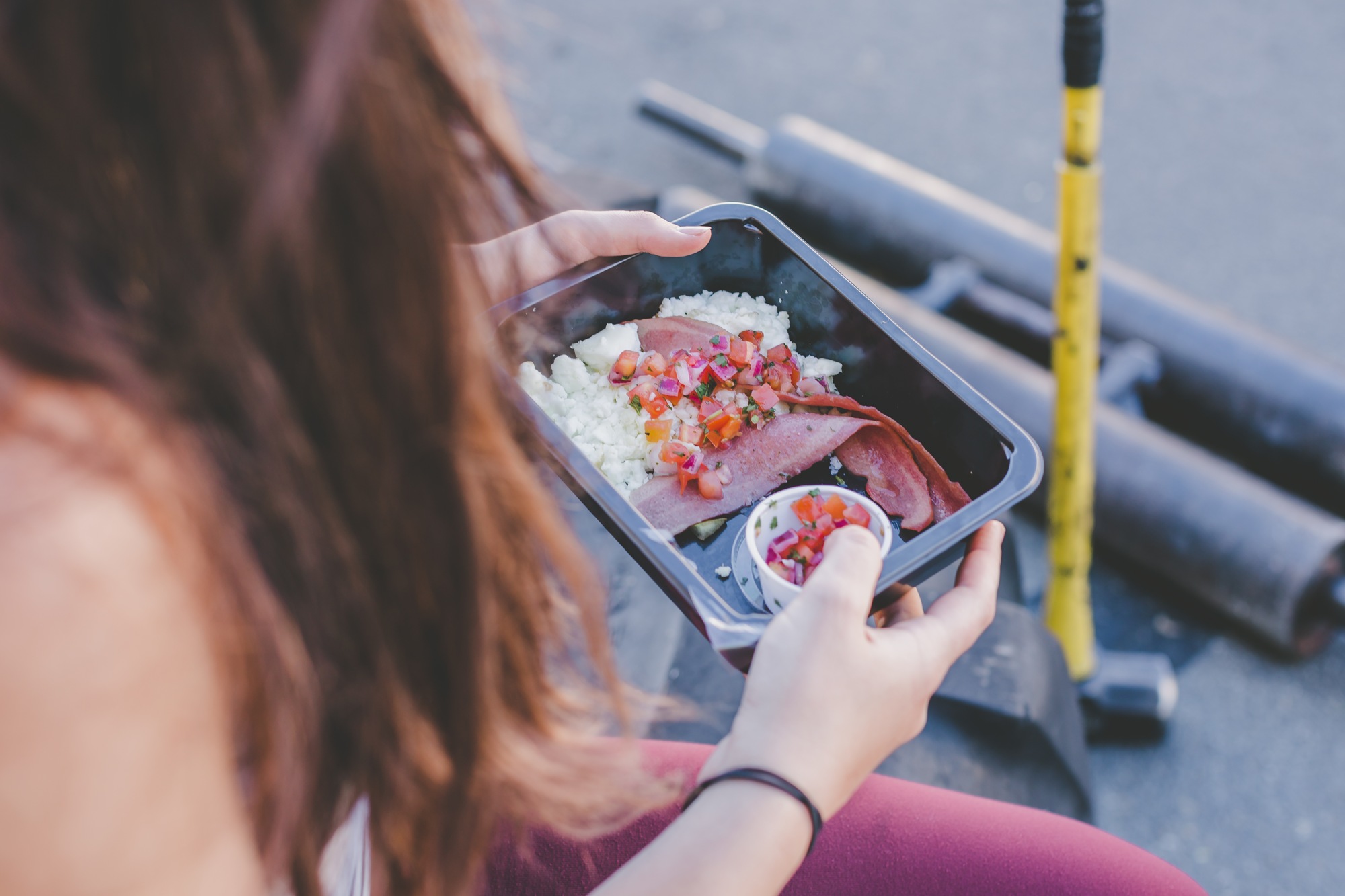 A prepared meal photographed in a gym setting